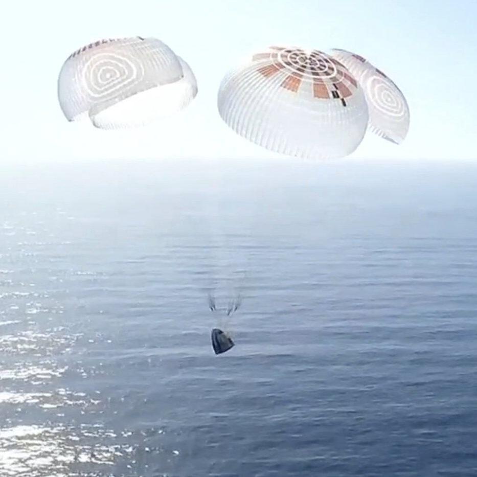 Four space tourists return to Earth after a private flight over the poles